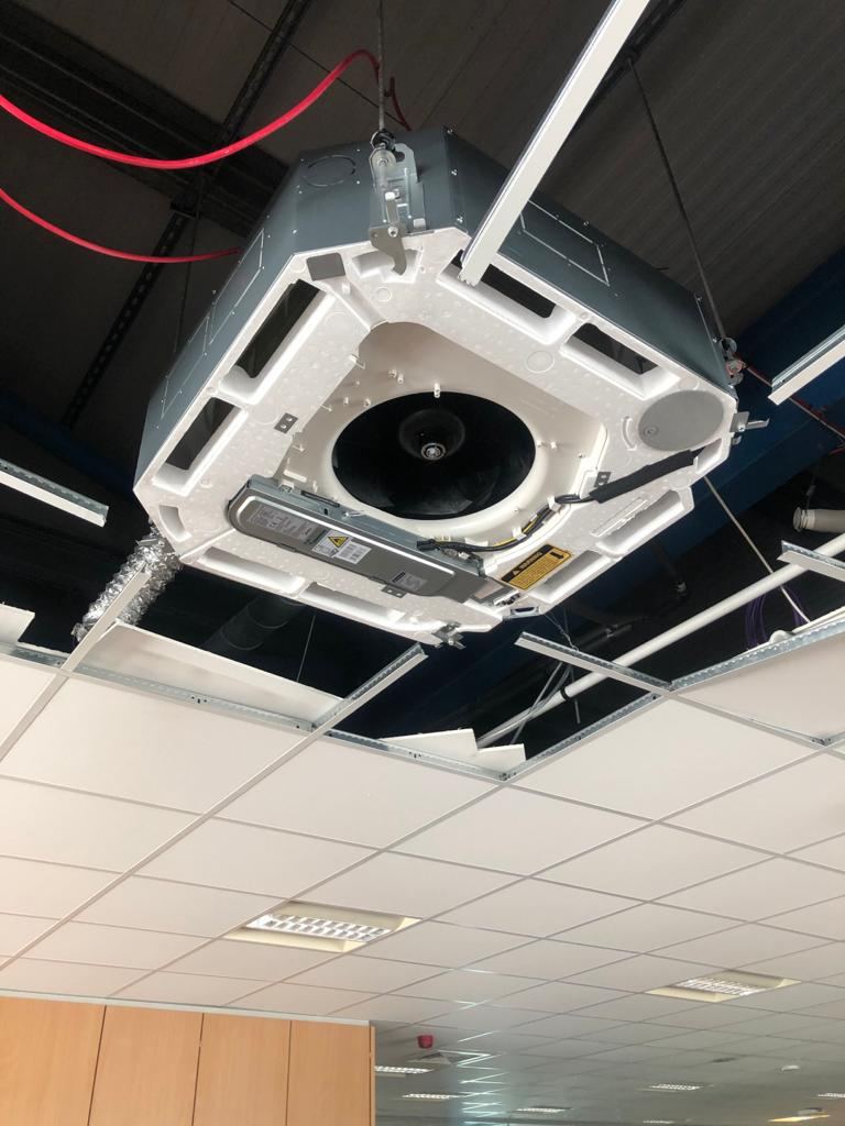 Ceiling cassette air conditioning unit in an office