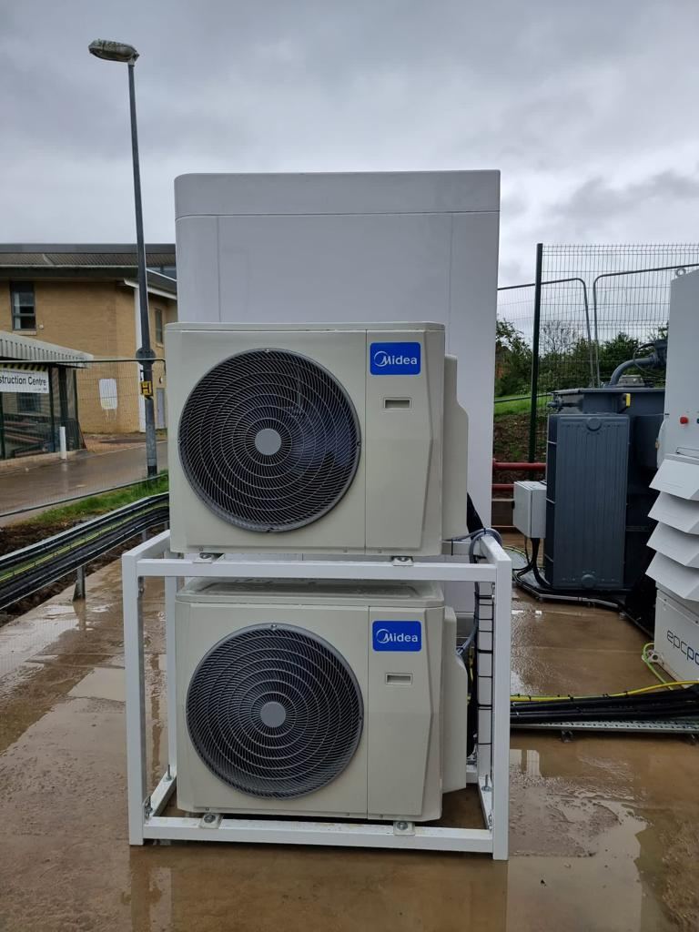 Stacked outdoor condensers on a steel frame